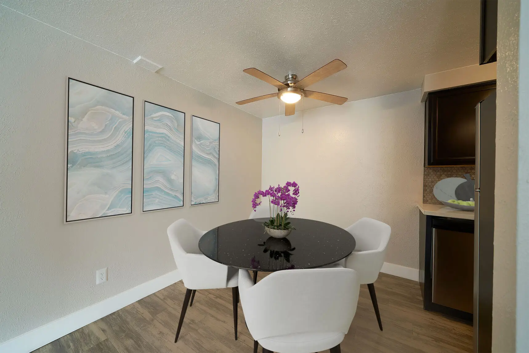 Dining area with ceiling fan